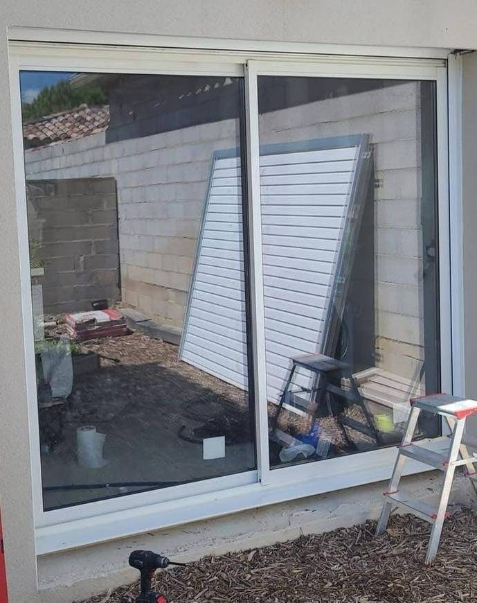 remplacement porte de garage par baie vitrée à Calas
